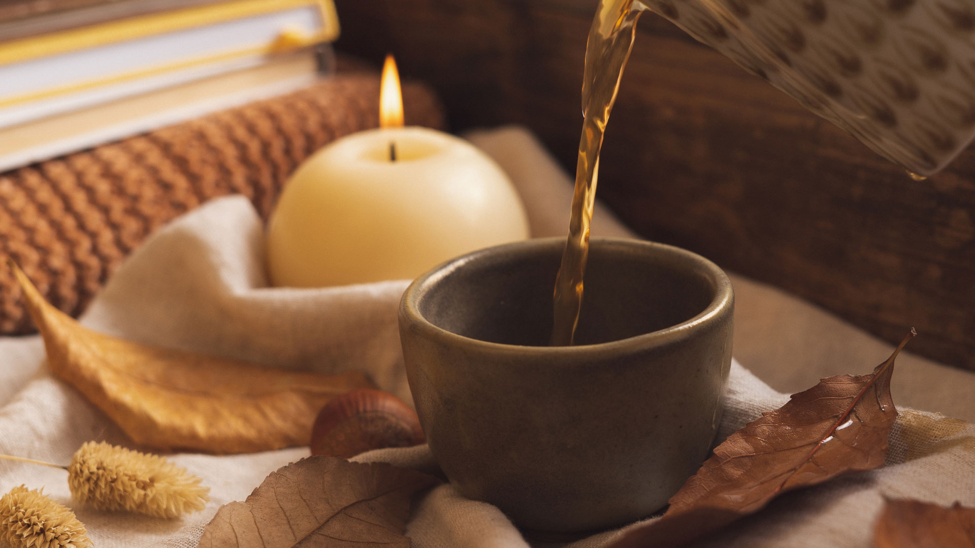 A cup of coffee being poured